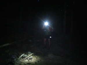 Marcin strapping on the headlamp for our last hour in the dark.